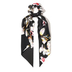 Floral patterned hair scarf on a white background