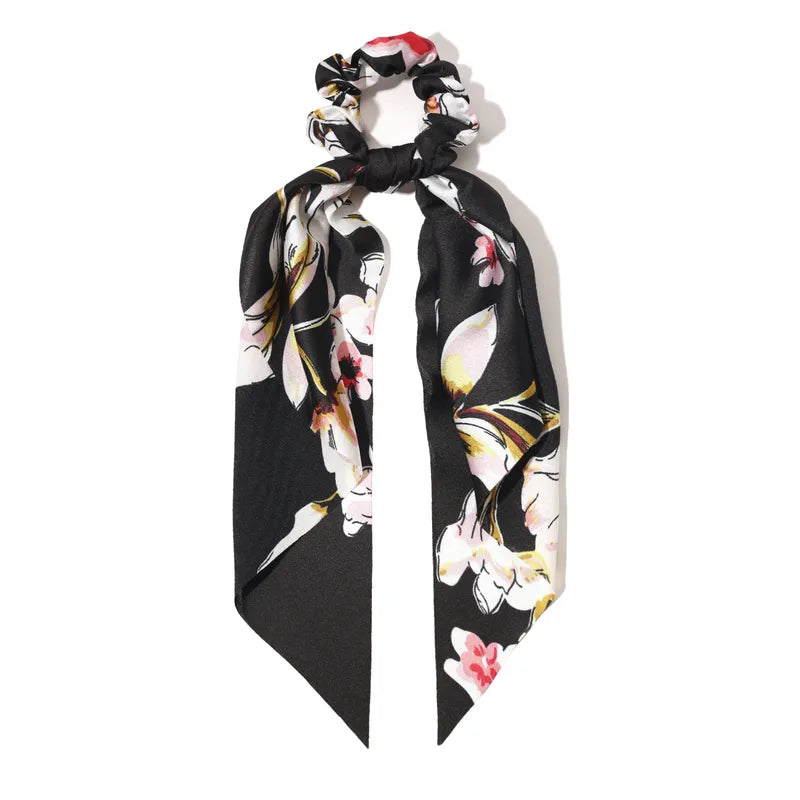 Floral patterned hair scarf on a white background