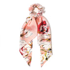 Floral headband with a bow on a white background