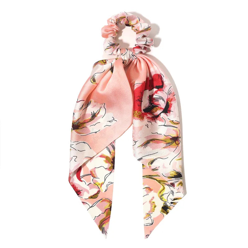 Floral headband with a bow on a white background