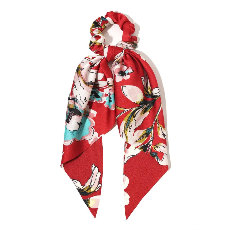 Red floral headband on a white background